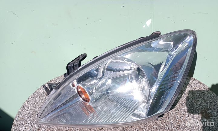 Фара левая для Митцубиси Лансер Mitsubishi Lancer
