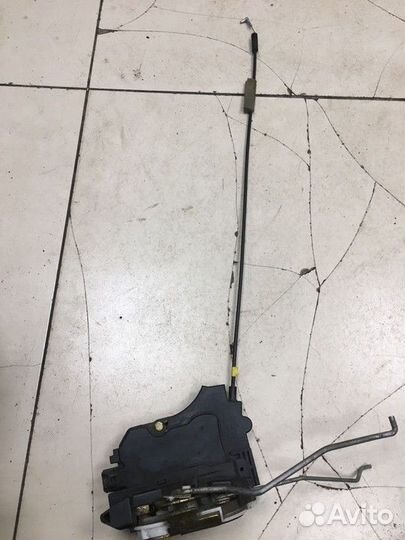 Замок двери передней левой Mitsubishi Lancer