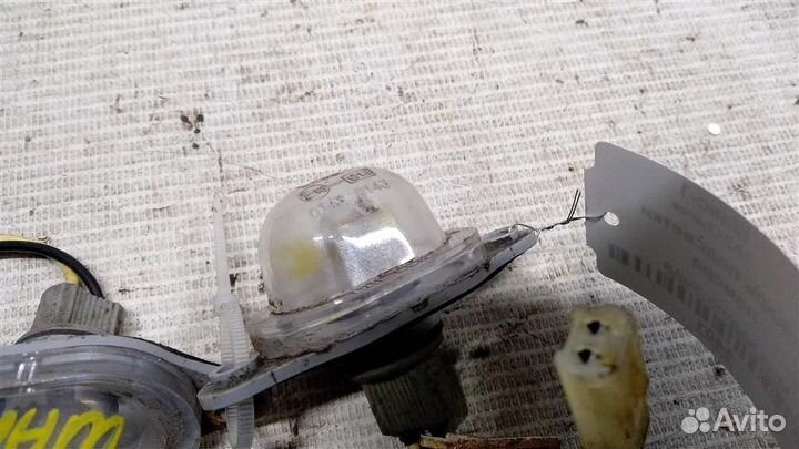 Фонарь подсветки номера ZAZ Chance 02г