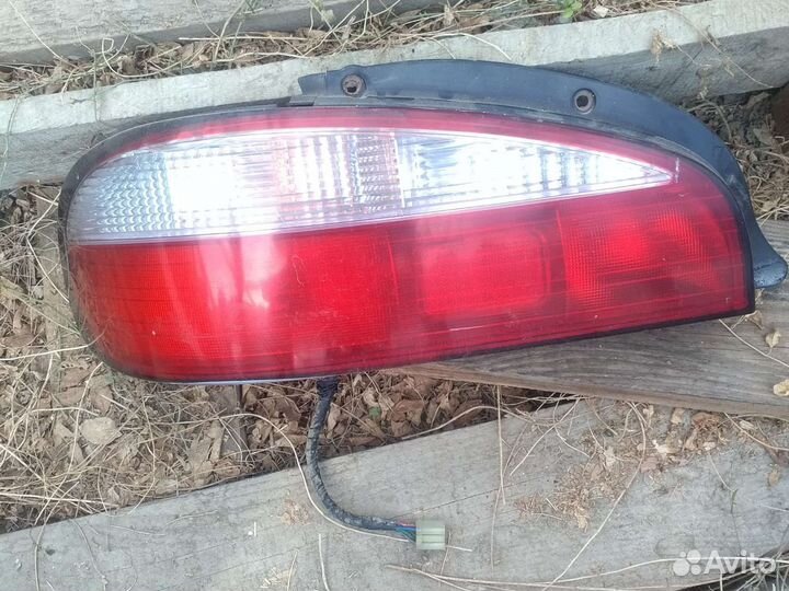 Фонарь Киа Кларус левый