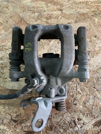 Суппорт задний левый Volkswagen Golf 6 (5 хб)