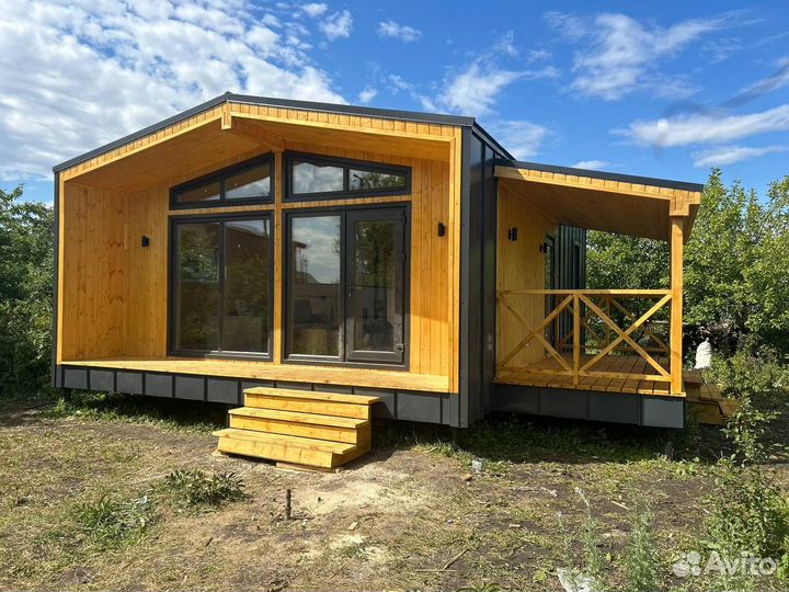 Каркасный дом 54 м2 с террасой и крыльцом под ключ