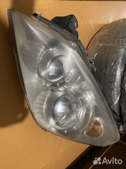 Левая фара Opel Astra H