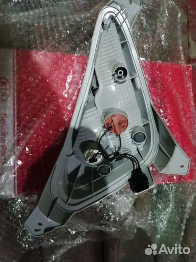 92305M6000 фонарь задний в бампер левый новый