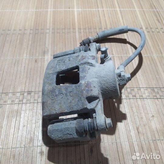 Суппорт тормозной передний правый Daewoo Nexia 1