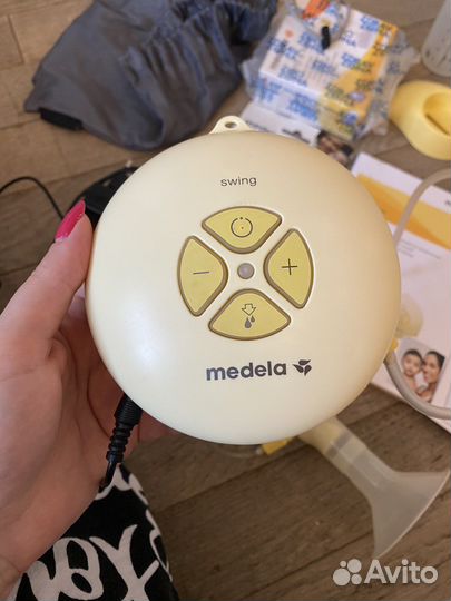 Молокоотсос medela электрический
