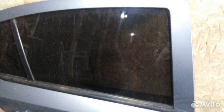 Стекло двери заднее правое Opel Astra H