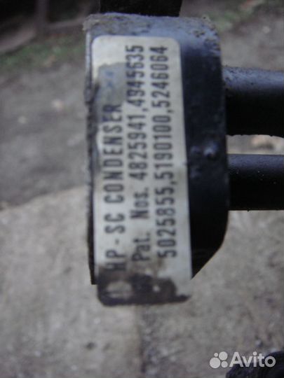 Радиатор кондиционера Mitsubishi Carisma