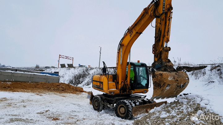 Экскаватор колёсный полноповоротный