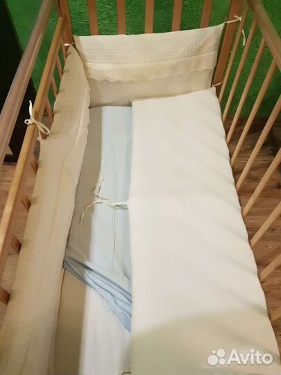 Детская кроватка с продольным маятником