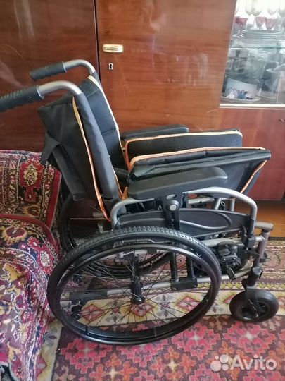Инвалидная коляска