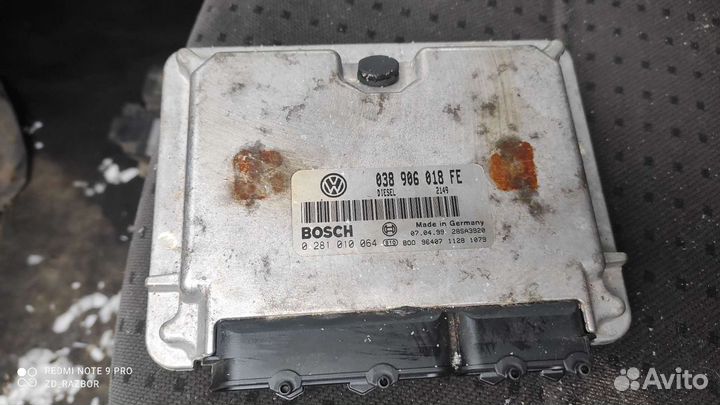 Блок управления двигателем passat 038906018FE