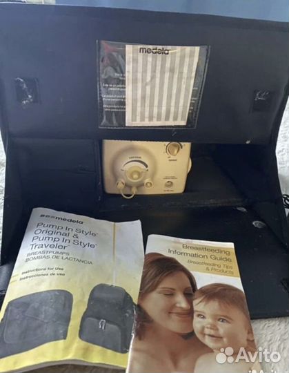 Молокоотсос medela электрический