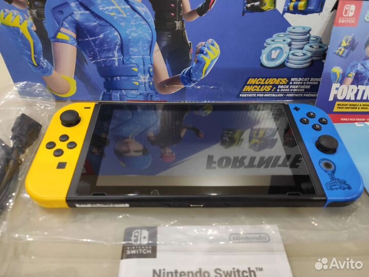 Продам прошитую Nintendo Switch и много игр