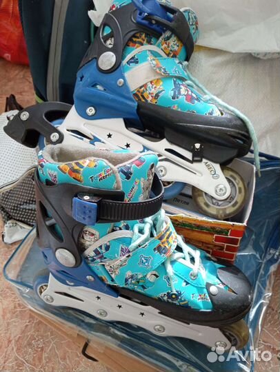 Роликовые коньки