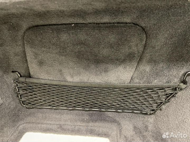Обшивка багажника левая Bmw G21