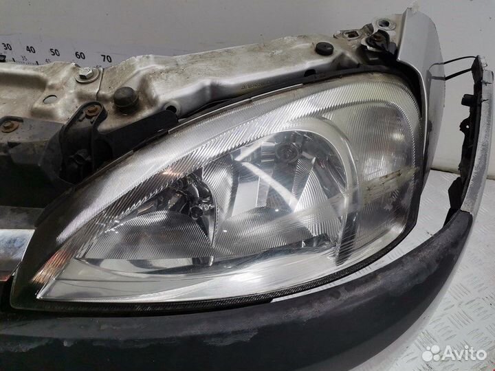 Бампер (ноускат) для Opel Corsa C R0B1F11K0V0