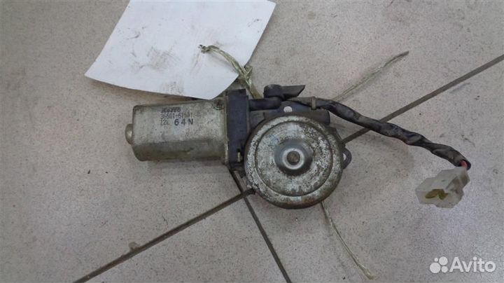 Моторчик стеклоподъемника задний левый Mazda 626