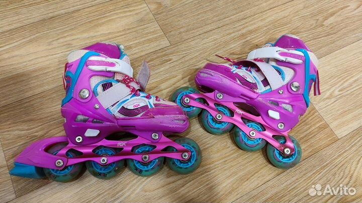 Роликовые коньки