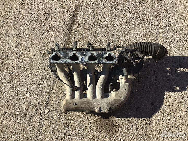 Впускной коллектор Kia Spectra