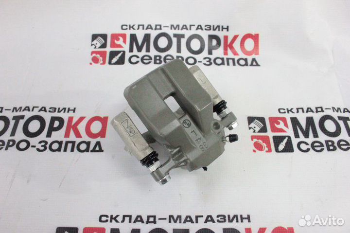 Суппорт тормозной задний левый Toyota Rav4 2azfe