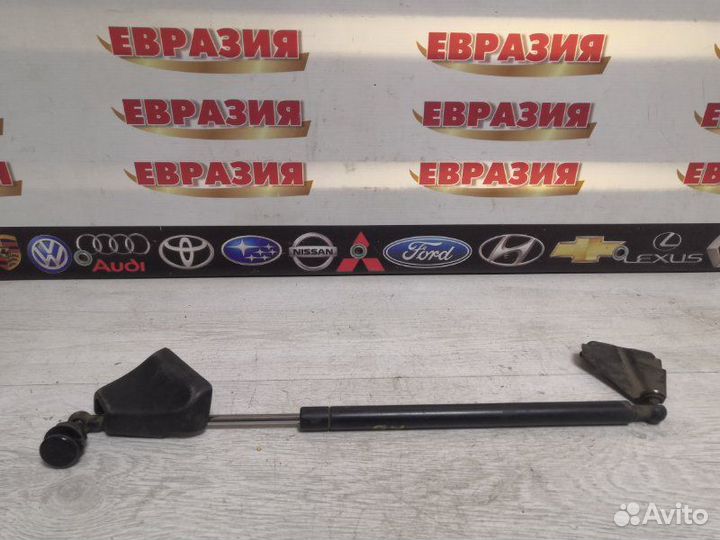 Амортизатор стекла двери багажника задний левый