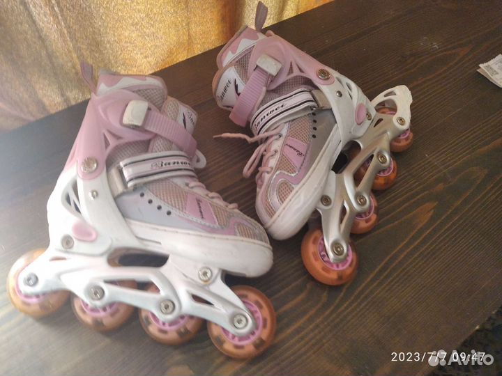 Роликовые коньки
