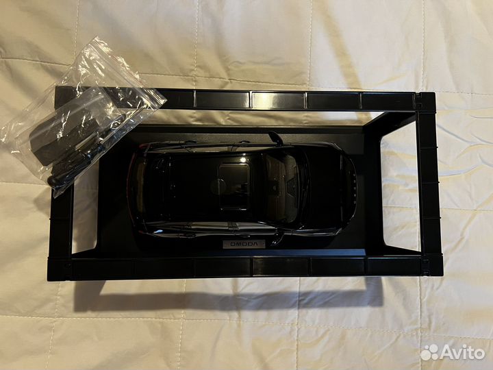 Моделька автомобиля omoda C5 T19C (черная)