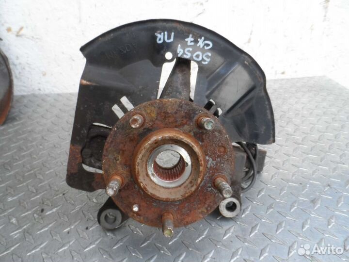 Кулак поворотный правый Mazda CX-7 ER