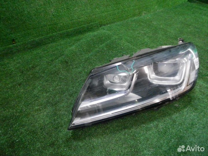 Фара левая Volkswagen Touareg