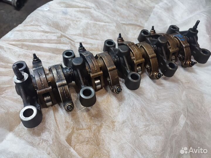 Вал коромысле Пежо 206