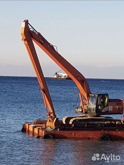 Экскаватор с длинной стрелой от 16 до 21 метра