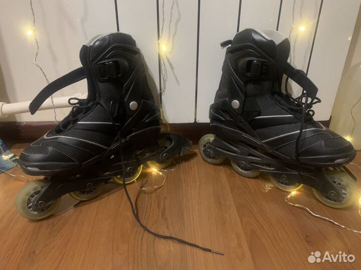 Роликовые коньки