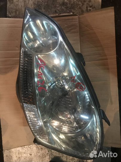 Фара левая Toyota Ipsum 21/26 xenon