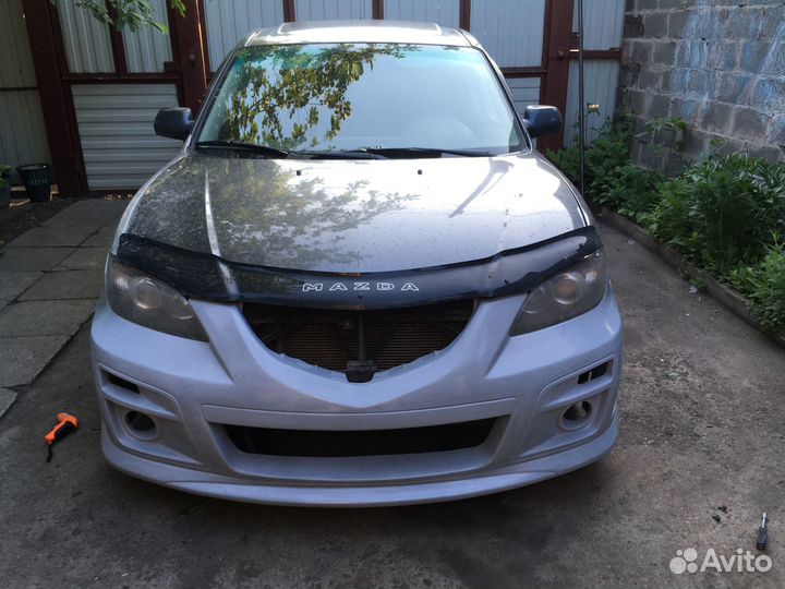 Бампер передний мазда 3