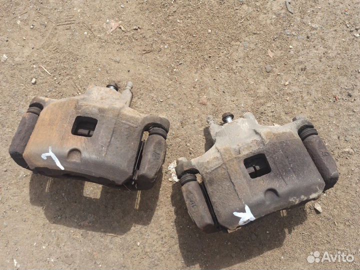 Тормозной суппорт mitsubishi lancer 10