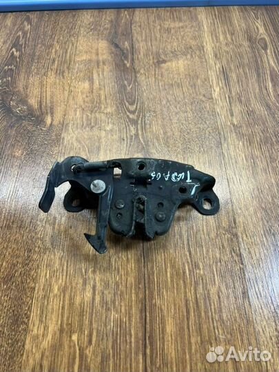 Замок капота передний Nissan Tiida С11 хэтчбек