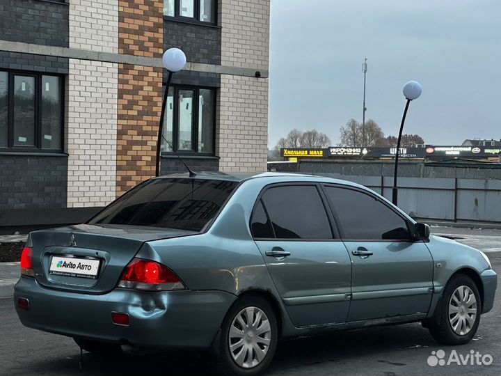 Mitsubishi Lancer 1.6 МТ, 2006, 289 000 км