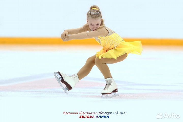Желтое платье для выступлений по фигурному катанию