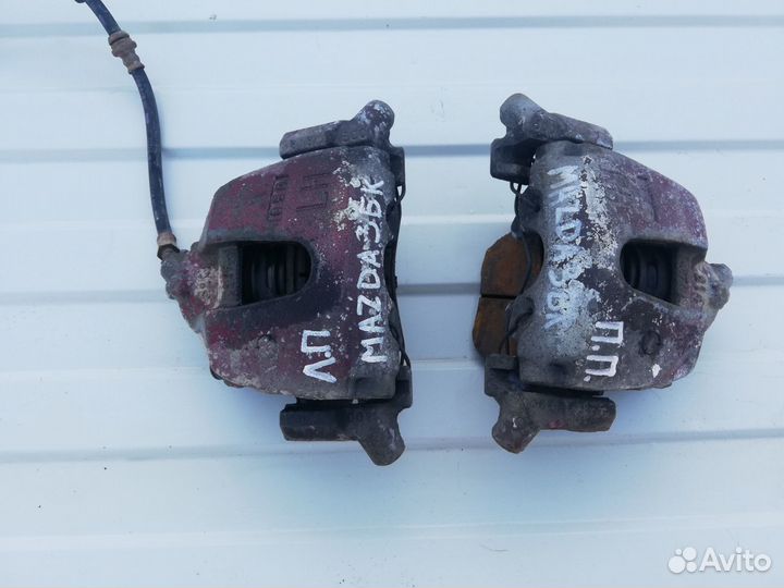 Передние тормозные суппорта Мазда 3 бк