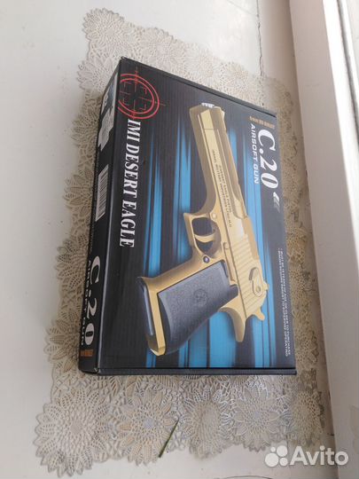 Игрушечный пистолет