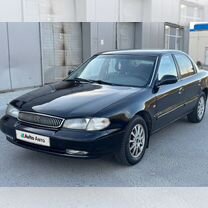 Kia Clarus 2.0 MT, 1997, 252 000 км, с пробегом, цена 245 000 руб.