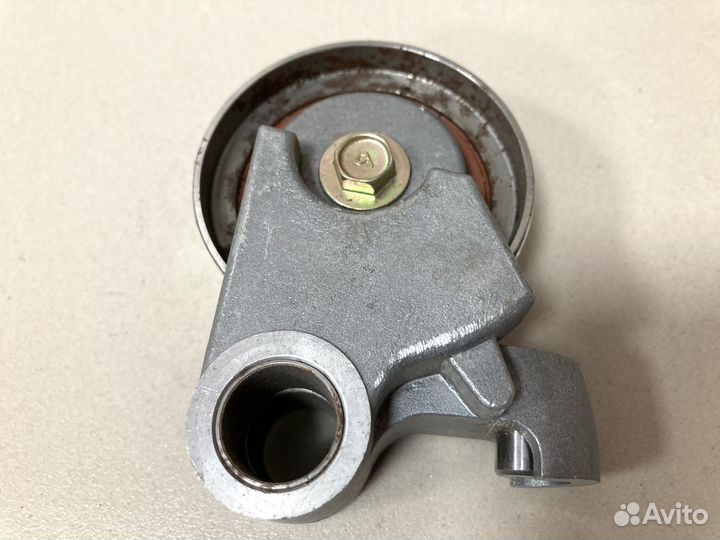 Ролик натяжителя ремня грм Toyota 1350546041 / 031