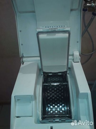 Стиральная машина с вертикальной загрузкой miele