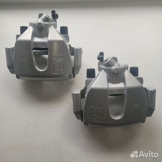 Суппорт тормозной передний Форд Фокус 2