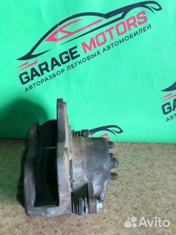 Суппорт тормозной передний правый Mitsubishi