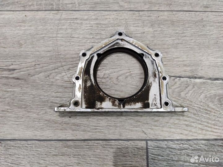 Крышка коленвала задняя Lancer Cedia