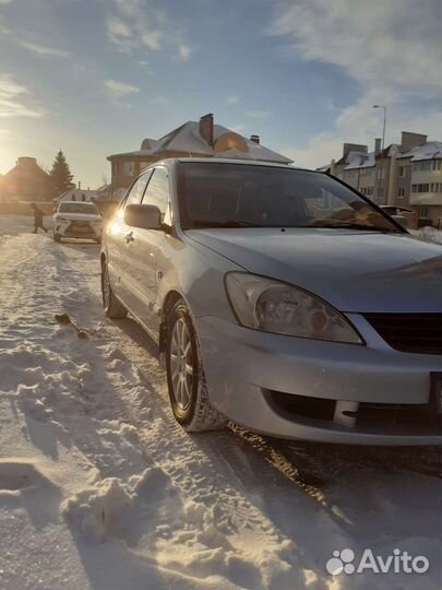 Mitsubishi Lancer 1.6 МТ, 2006, 242 000 км