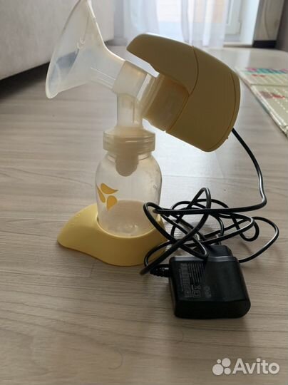 Молокоотсос medela электрический