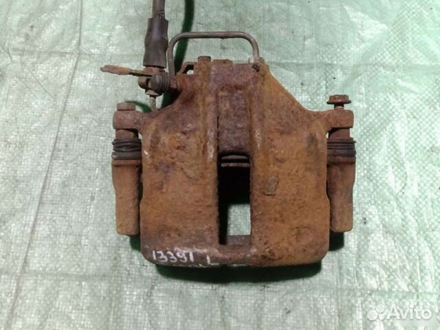 Суппорт передний левый Volkswagen Passat B5